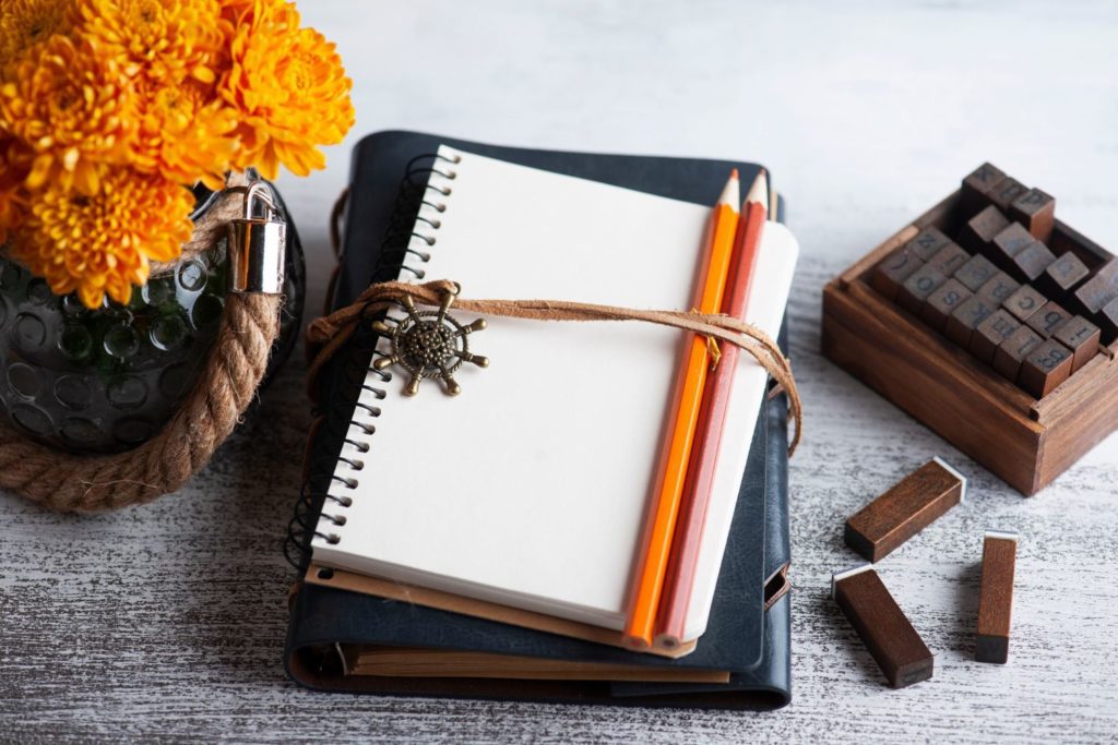 a stack of journaling supplies