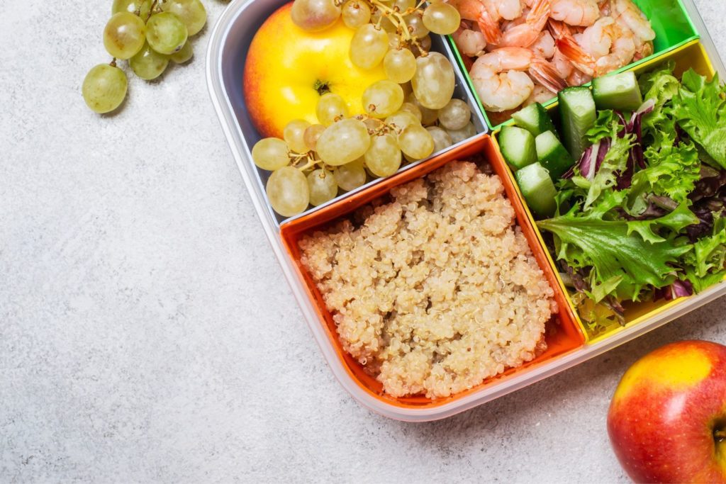 a meal placed in a meal prep container ready to be eaten